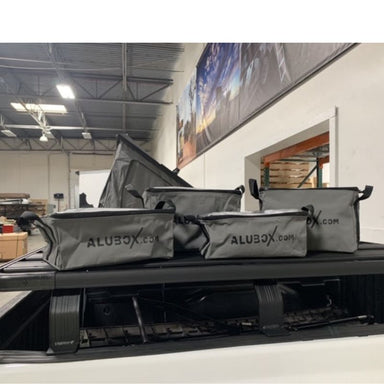 alubox-packing-organizer-gray-front-view-on-vehicle-in-warehouse