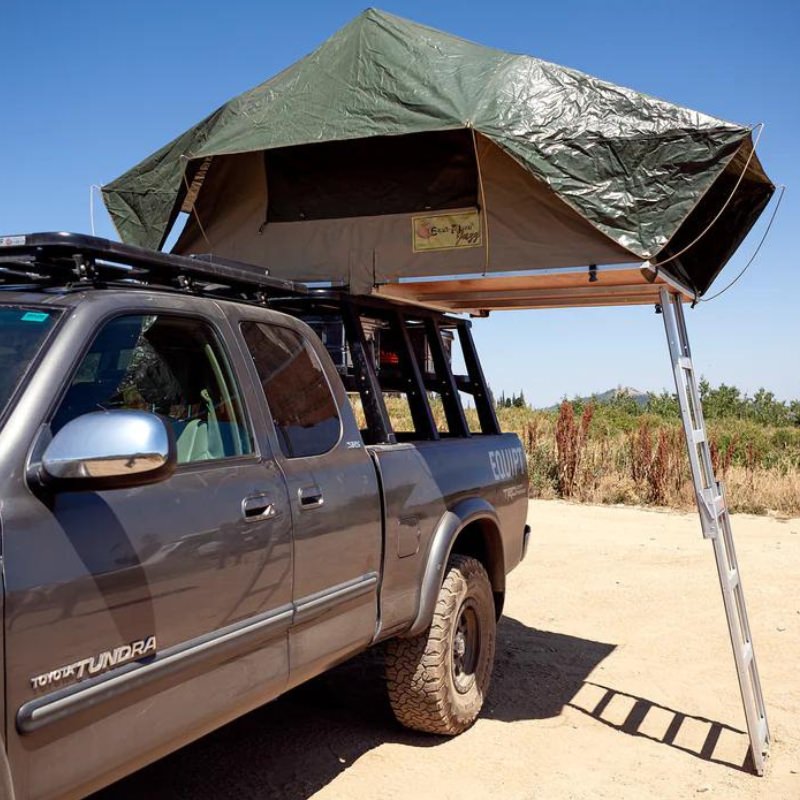 eezi-awn-jazz-soft-shell-roof-top-tent-beige-open-side-view-on-vehicle-with-cover-and-ladder