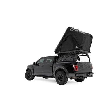 freespirit-recreation-aspen-lite-xl-hard-shell-roof-top-tent-black-open-rear-corner-view-on-ford-f150-on-white-background
