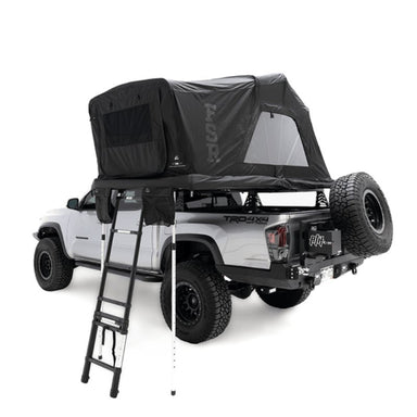 freespirit-recreation-high-country-v2-mini-soft-shell-roof-top-tent-open-front-corner-view-on-toyota-tacoma-with-aluminum-ladder-on-white-background