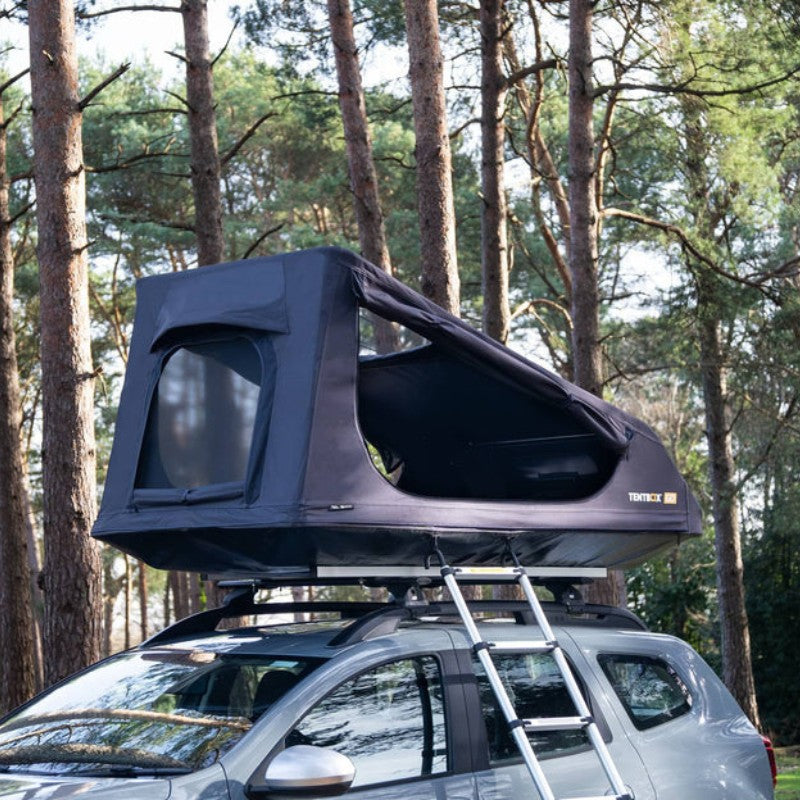 tentbox-go-hybrid-roof-top-tent-black-open-front-corner-view-on-vehicle-in-nature