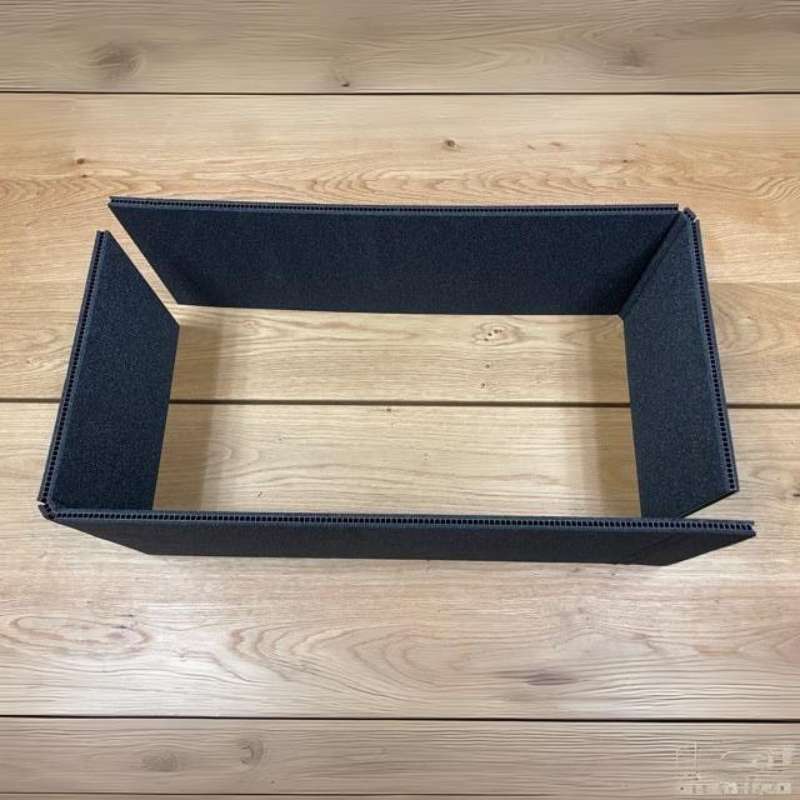alubox-case-divider-system-perimeter-walls-black-top-view-on-table
