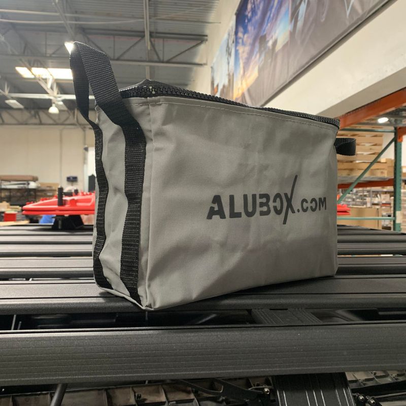 alubox-packing-organizer-size-2-gray-side-view-on-vehicle-in-warehouse