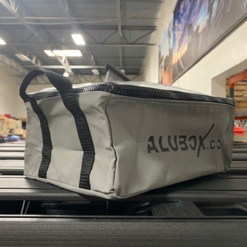 alubox-packing-organizer-size-3-gray-side-view-on-vehicle-in-warehouse
