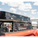 cbi-bed-bar-molle-panel-front-corner-view-with-bed-bars-on-truck-bed-in-terrain