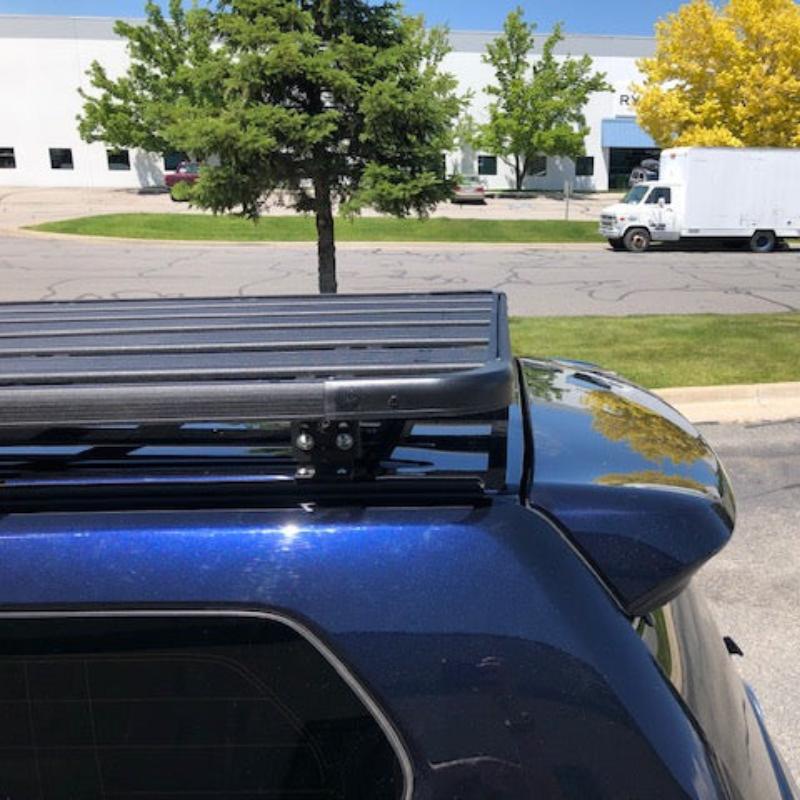 eez-awn-k9-roof-rack-for-lexus-gx-close-up-view-with-truck-in-parking-area