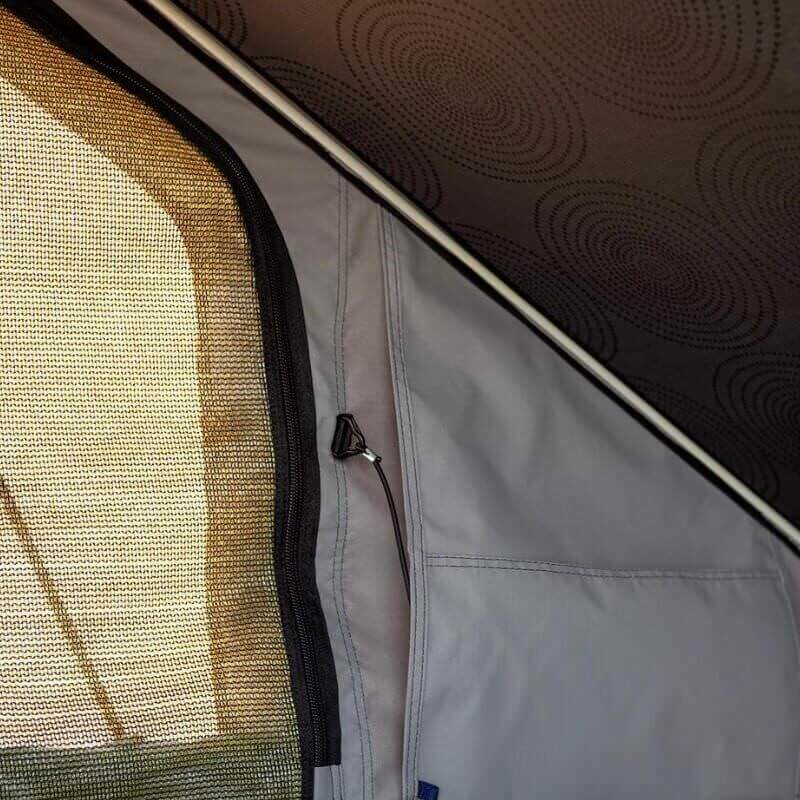 eezi-awn-blade-hard-shell-roof-top-tent-open-interior-view-with-mesh-creen
