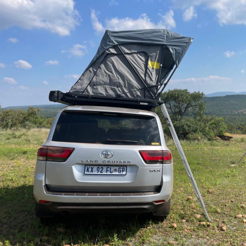 eezi-awn-galaxy-soft-shell-rooftop-tent-open-side-view-on-toyota-land-cruiser-view-in-nature