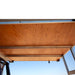 eezi-awn-jazz-soft-shell-roof-top-tent-open-interior-view-of-hardwood-panel