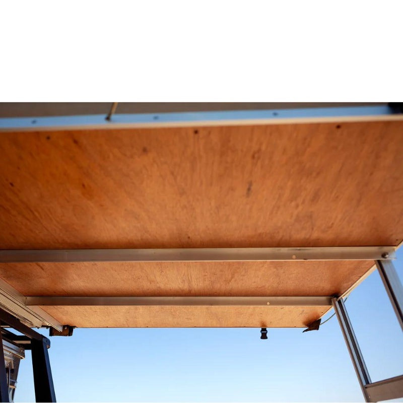 eezi-awn-jazz-soft-shell-roof-top-tent-open-interior-view-of-hardwood-panel