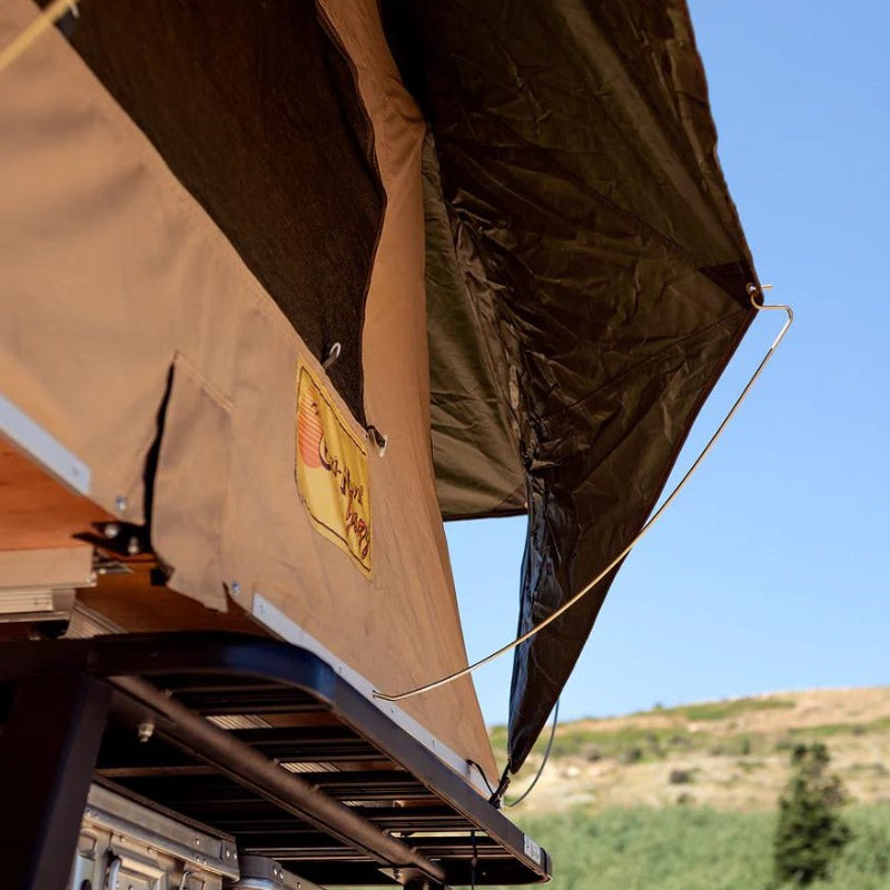 eezi-awn-jazz-soft-shell-roof-top-tent-open-side-view-of-mesh-screen-and-window-rods-with-cover