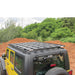 eezi-awn-k9-roof-rack-for-jeep-wrangler-jk-top-view-with-spare-tire-in-nature