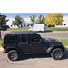 eezi-awn-k9-roof-rack-for-jeep-wrangler-jl-side-view-with-truck-on-background-in-parking-area
