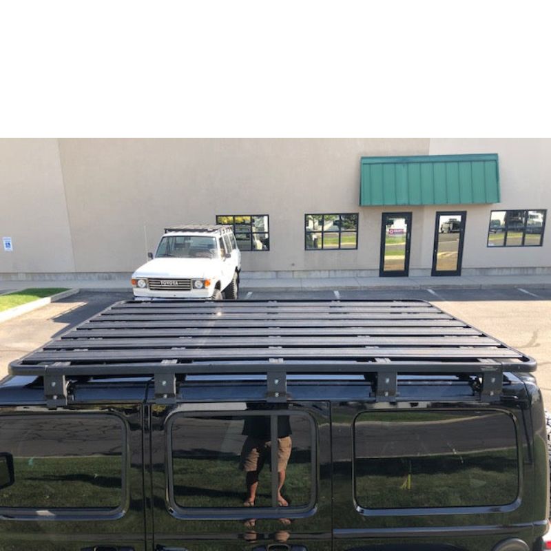eezi-awn-k9-roof-rack-for-jeep-wrangler-jl-top-view-with-vehicle-on-background-in-parking-area