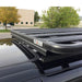 eezi-awn-k9-roof-rack-for-toyota-4runner-3rd-gen-close-up-view-with-brand-logo-on-parking-lot