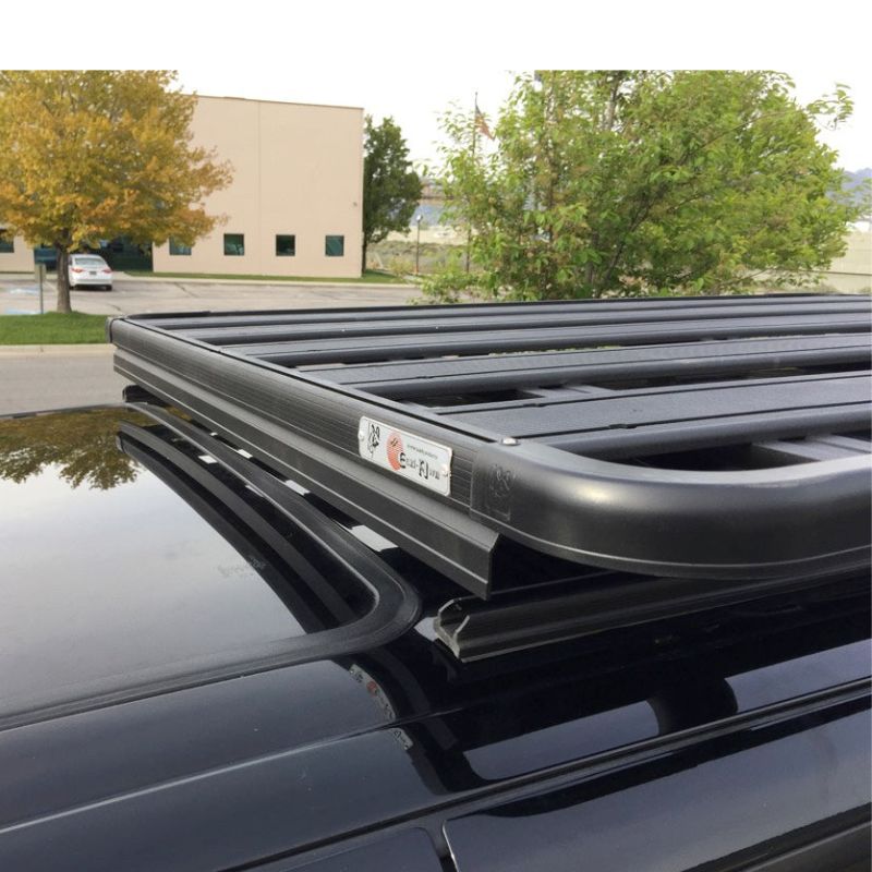 eezi-awn-k9-roof-rack-for-toyota-4runner-3rd-gen-close-up-view-with-brand-logo-on-parking-lot