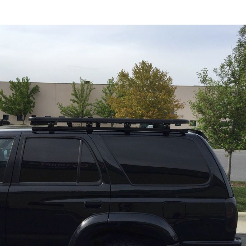 eezi-awn-k9-roof-rack-for-toyota-4runner-3rd-gen-close-up-view-with-trees-on-background