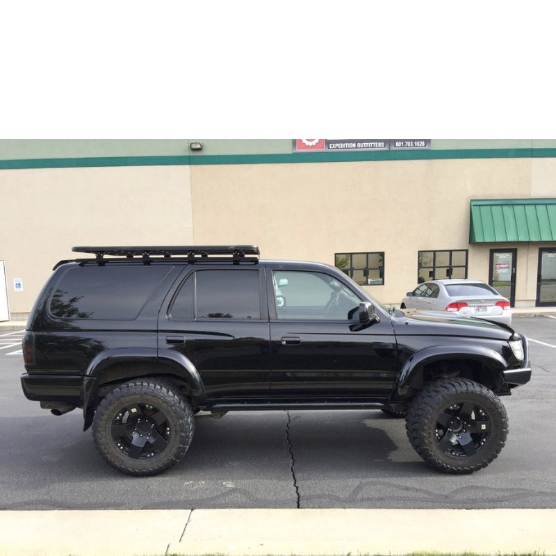eezi-awn-k9-roof-rack-for-toyota-4runner-3rd-gen-side-view-with-building-at-the-back