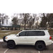 eezi-awn-k9-roof-rack-for-toyota-land-cruiser-200-series-side-view-in-park