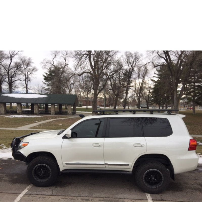 eezi-awn-k9-roof-rack-for-toyota-land-cruiser-200-series-side-view-in-park