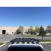eezi-awn-k9-roof-rack-for-toyota-land-cruiser-200-series-top-view-with-bubilding-and-cars-in-parking-lot