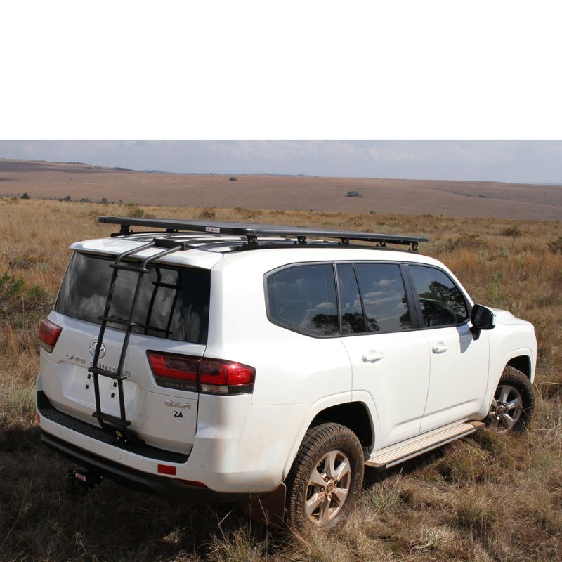 eezi-awn-k9-roof-rack-for-toyota-land-cruiser-300-series-rear-corner-view-in-nature