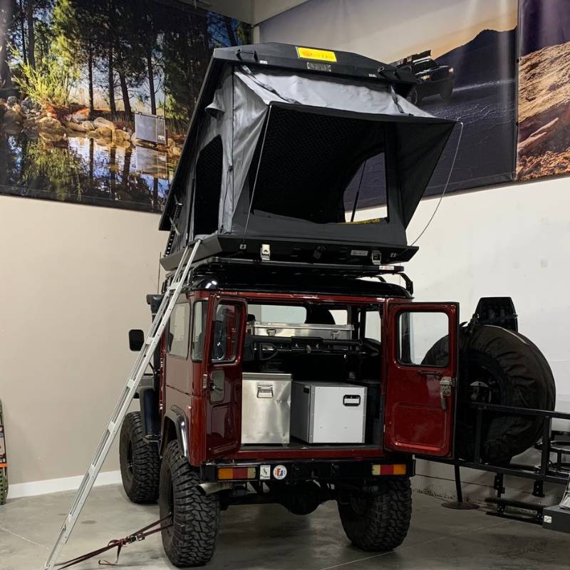 eezi-awn-k9-roof-rack-for-toyota-land-cruiser-40-series-rear-view-with-roof-top-tent-inside-shop