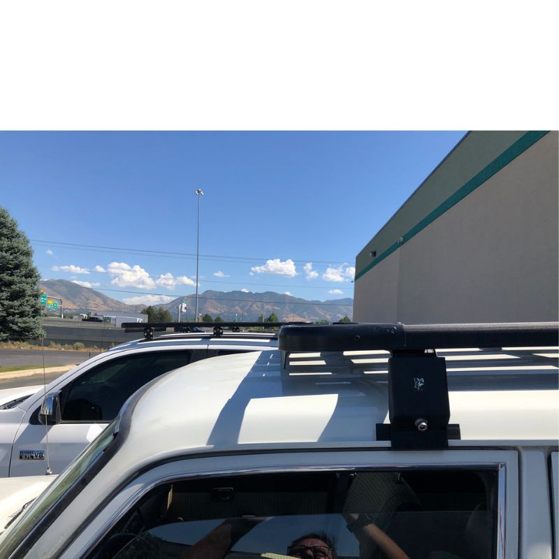 eezi-awn-k9-roof-rack-for-toyota-land-cruiser-60-close-up-view-with-mauntains-in-background-on-parking-lot