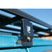 eezi-awn-k9-roof-rack-for-toyota-land-cruiser-60-close-up-view-with-roof-rack-leg-on-blue-land-cruiser-in-nature