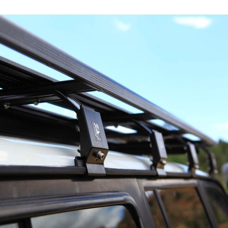 eezi-awn-k9-roof-rack-for-toyota-land-cruiser-80-series-side-view-with-roof-rack-legs-in-nature