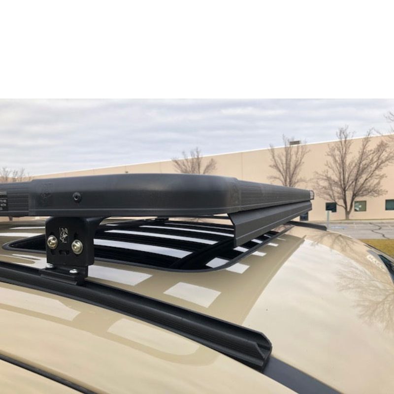 eezi-awn-k9-roof-rack-for-toyota-tacoma-close-up-view-close-up-with-building-on-background