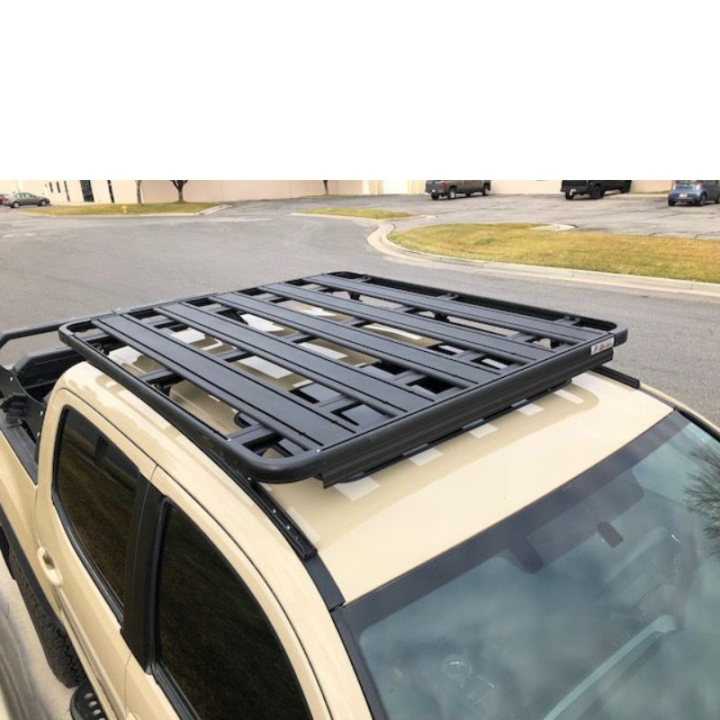 eezi-awn-k9-roof-rack-for-toyota-tacoma-top-view-with-road-and-other-vehicles-on-background