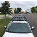 eezi-awn-k9-roof-rack-for-toyota-tundra-2nd-gen-front-view-with-building-on-background-in-parking-area