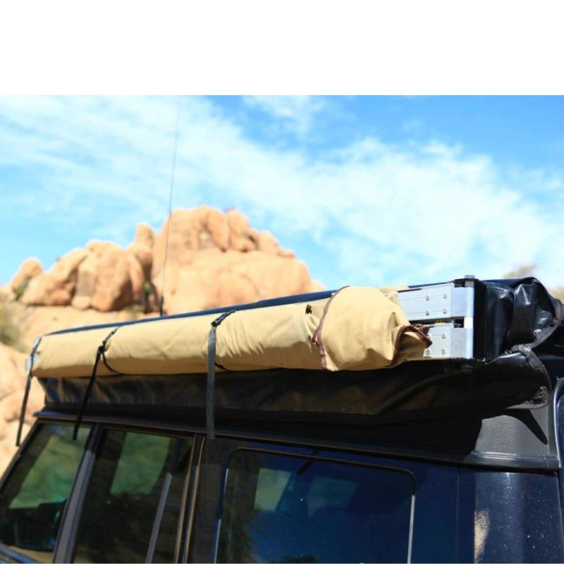 eezi-awn-manta-270-awning-beige-close-back-corner-side-view-in-nature