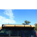 eezi-awn-manta-270-awning-beige-close-side-view-in-nature