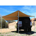 eezi-awn-manta-270-awning-beige-open-rear-back-view-on-land-cruiser-in-nature