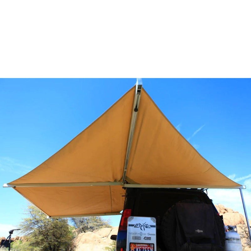 eezi-awn-manta-270-awning-beige-open-rear-interior-view-on-land-cruiser-in-nature