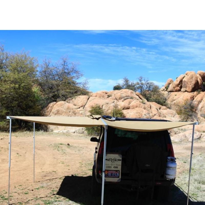 eezi-awn-manta-270-awning-beige-open-upper-back-view-in-nature