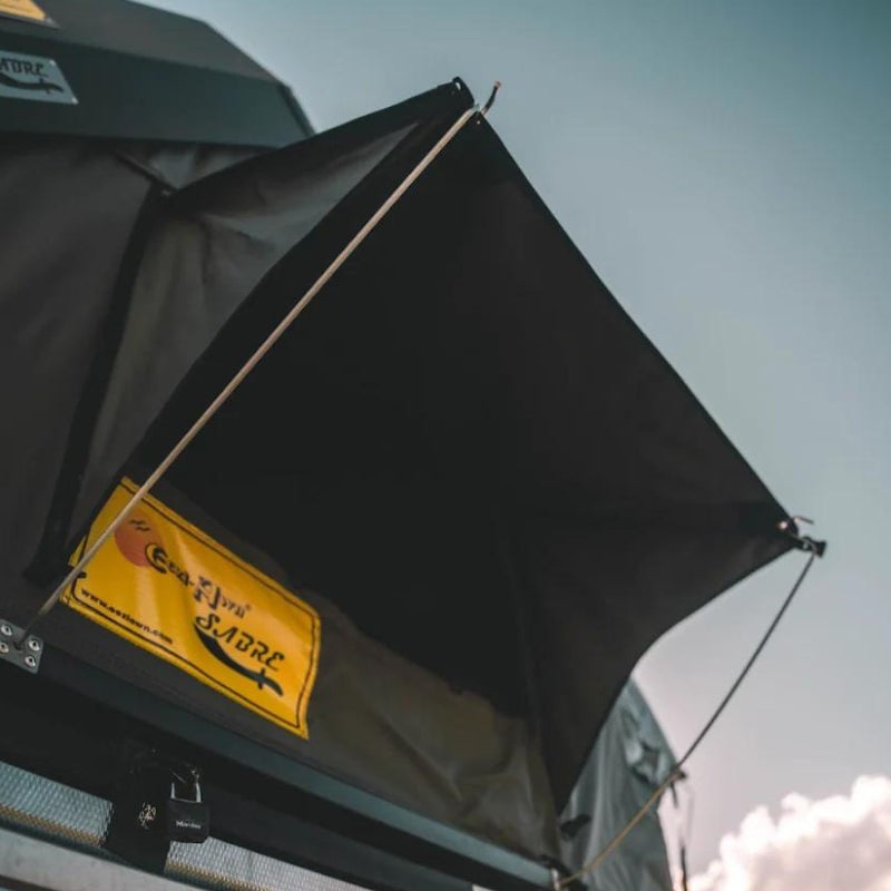 eezi-awn-sabre-hard-shell-roof-top-tent-open-close-up-view-on-vehicle-with-support-rods