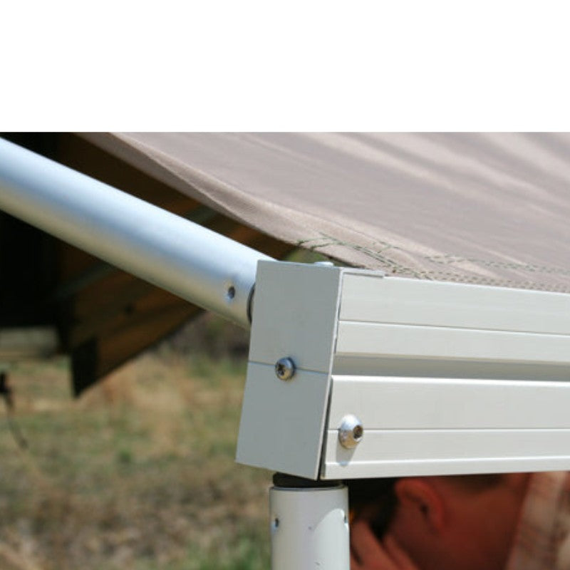eezi-awn-series-1000-awning-beige-open-close-up-view-silver-hardcase-aluminum-frame-in-nature