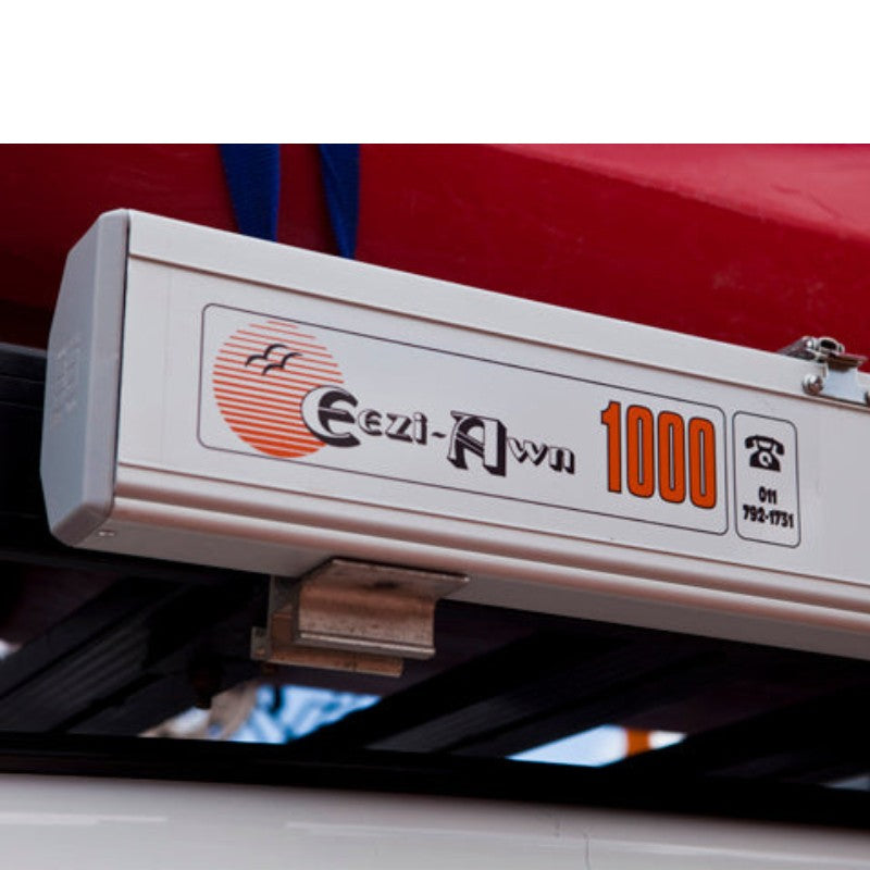 eezi-awn-series-1000-awning-close-cole-up-view-silver-hardcase-brand-logo