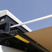 eezi-awn-series-2000-awning-beige-open-close-up-view-black-hardcase-with-brand-logo-beside-hard-shell-tent-on-vehicle-in-nature