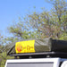 eezi-awn-series-3-soft-shell-roof-top-tent-closed-close-up-view-of travel-cover-on-vehicle-in-nature