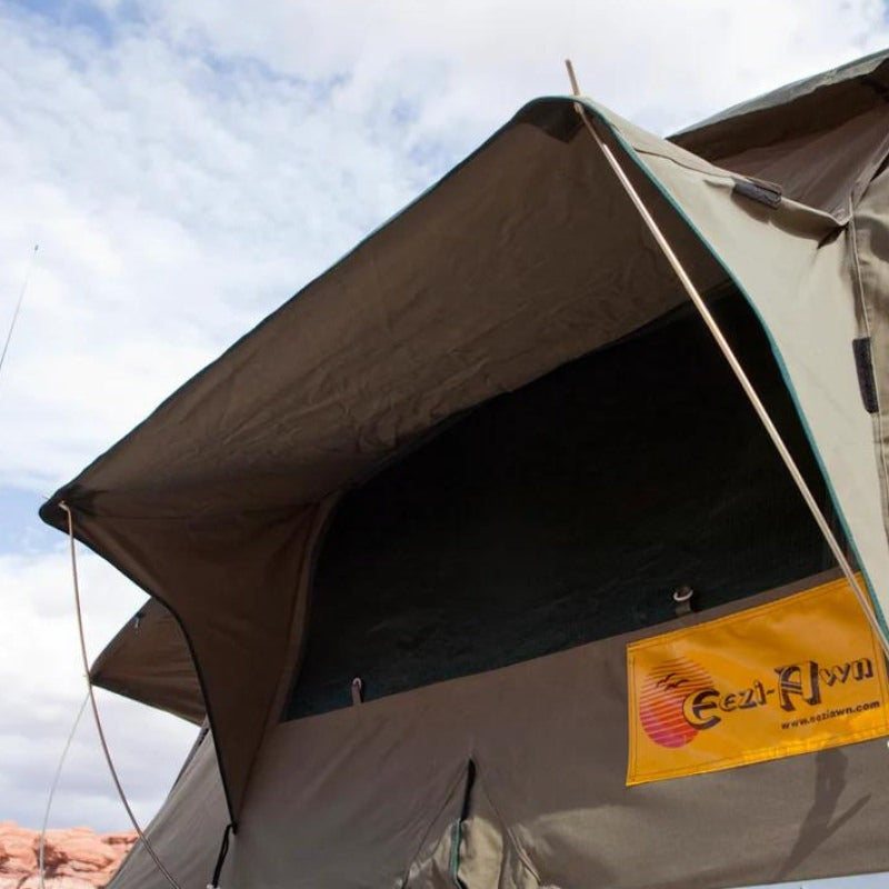 eezi-awn-series-3-soft-shell-roof-top-tent-open-beige-close-up-view-of-window-rainfly-and-spring-steel-rods