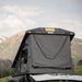eezi-awn-stealth-hard-shell-roof-top-tent-open-rear-view-on-ford-explorer-in-nature