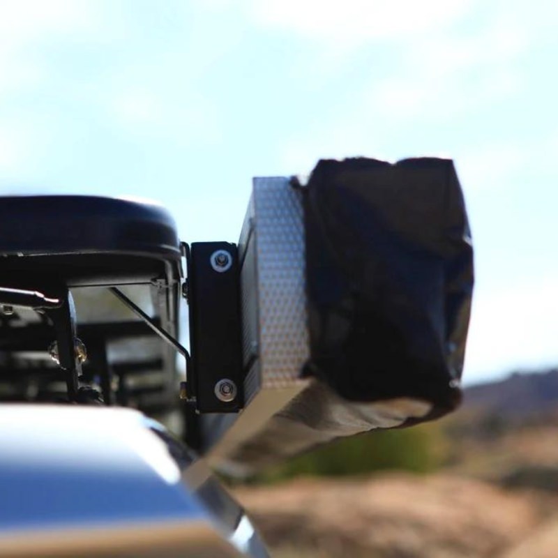 eezi-awn-swift-awning-beige-close-back-view-close-up-on-vehicle-in-terrain