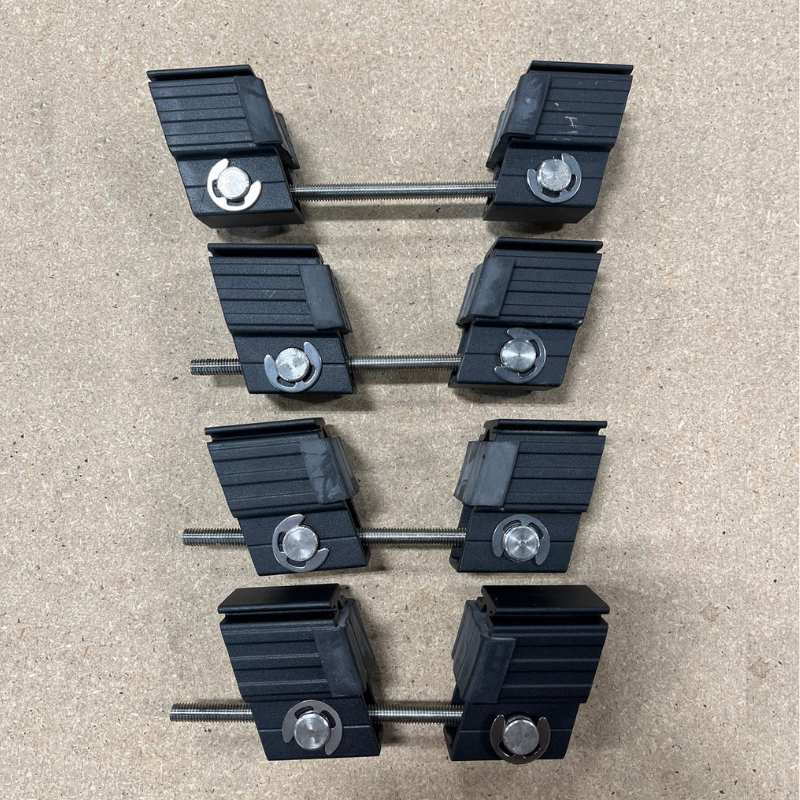 eezi-awn-tent-mount-sets-clamp-on-top-view-on-the-floor