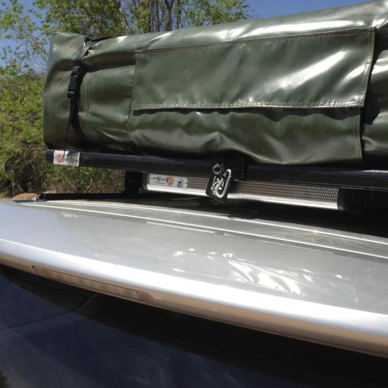 eezi-awn-xklusiv-soft-shell-roof-top-tent-olive-closed-close-up-view-on-vehicle-with-zipper