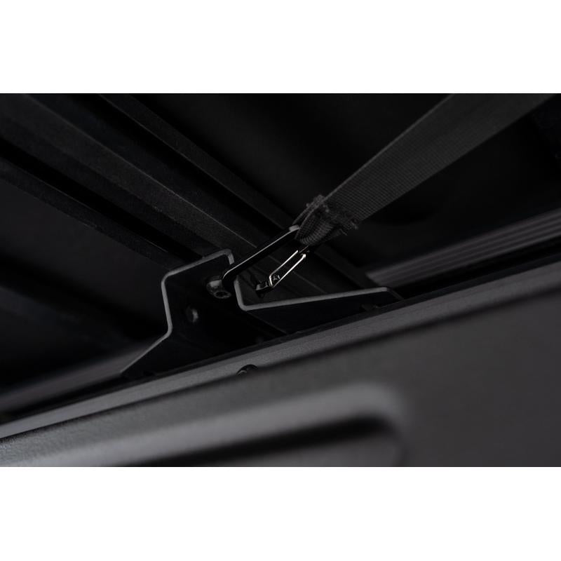 freespirit-recreation-270-awning-v2-close-up-view-of-tightening-strap-hook-on-toyota-tacoma