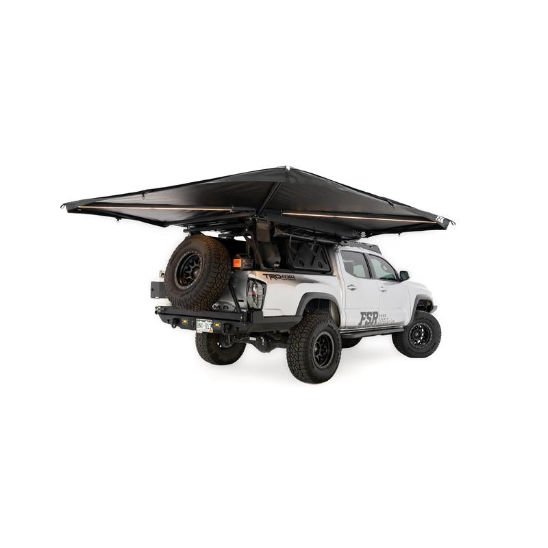 freespirit-recreation-270-awning-v2-open-rear-corner-view-on-toyota-tacoma-on-white-background